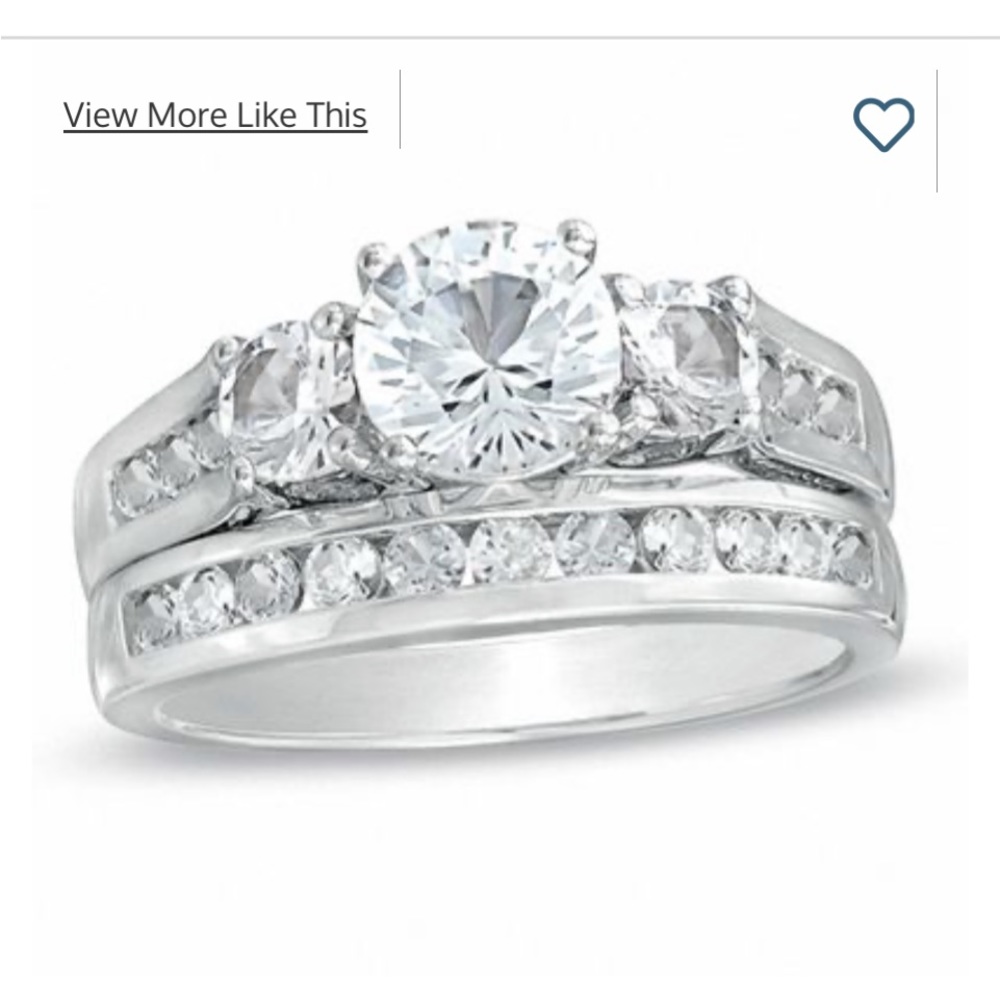 Lab created white sapphire silver ring. Has never been worn.